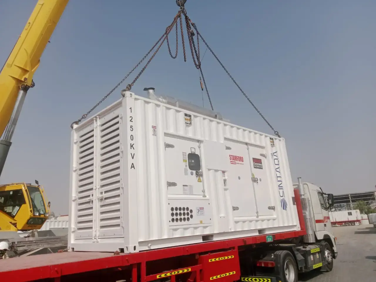 SINTAQA 1,250 kVA containerised generator being lifted into position