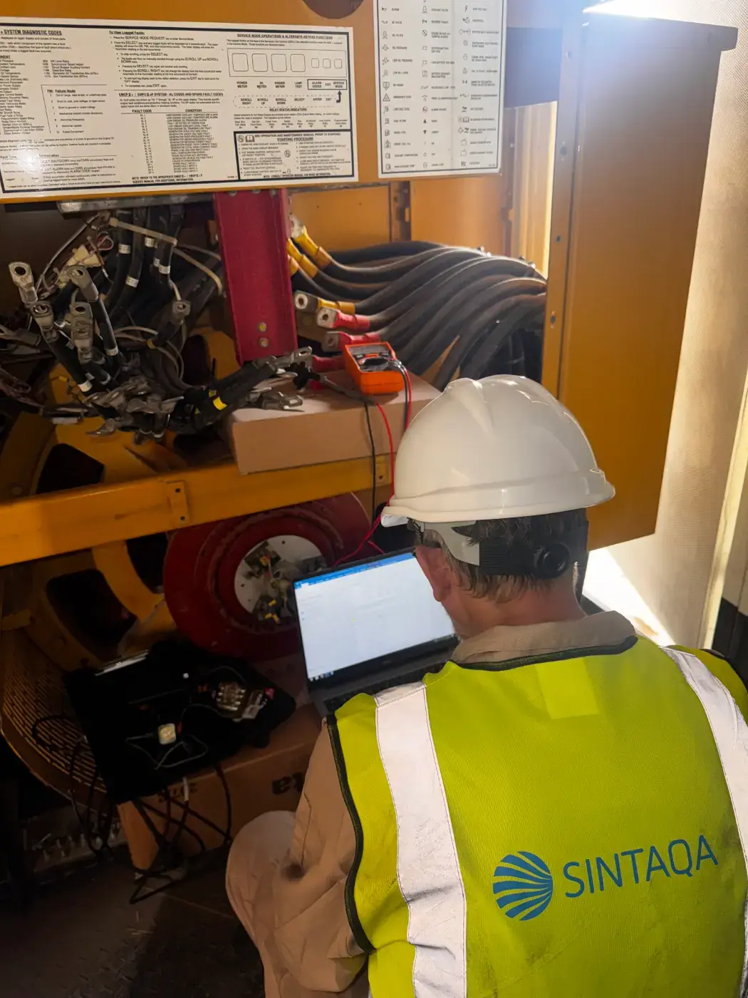 SINTAQA engineer running generator diagnostics